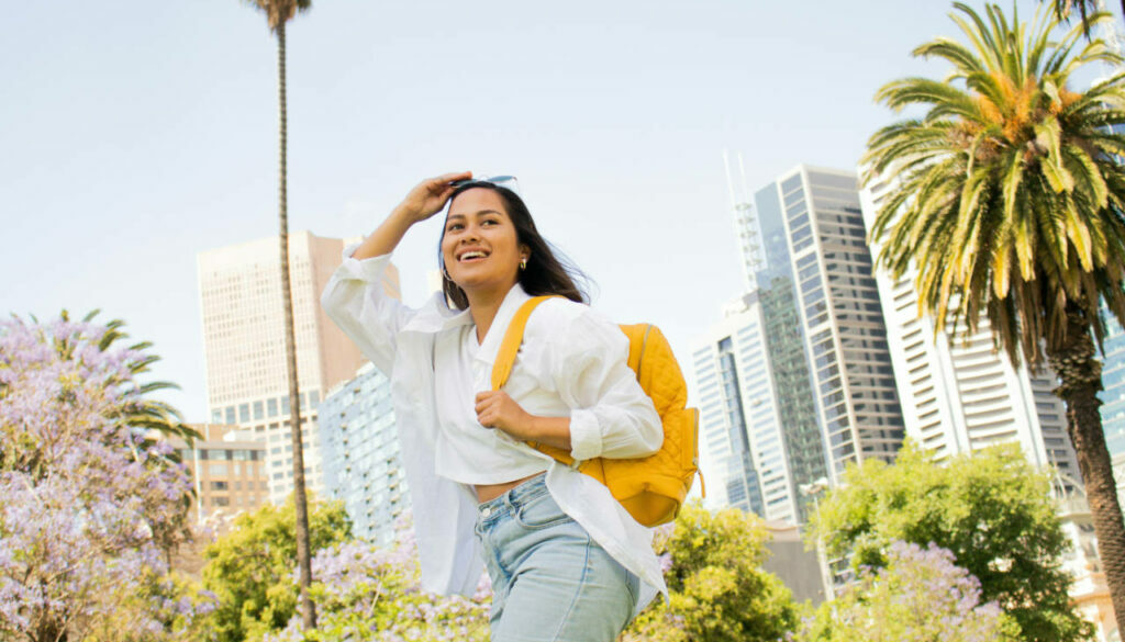 Student with backpack and sunglasses