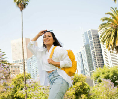 Student with backpack and sunglasses